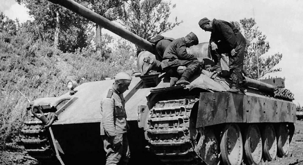 Red Army soldiers on a captured German Panther.